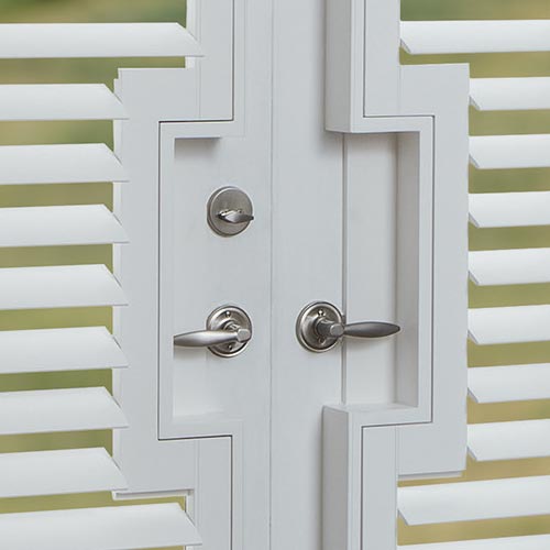 door handle cut-outs in shutters on french doors