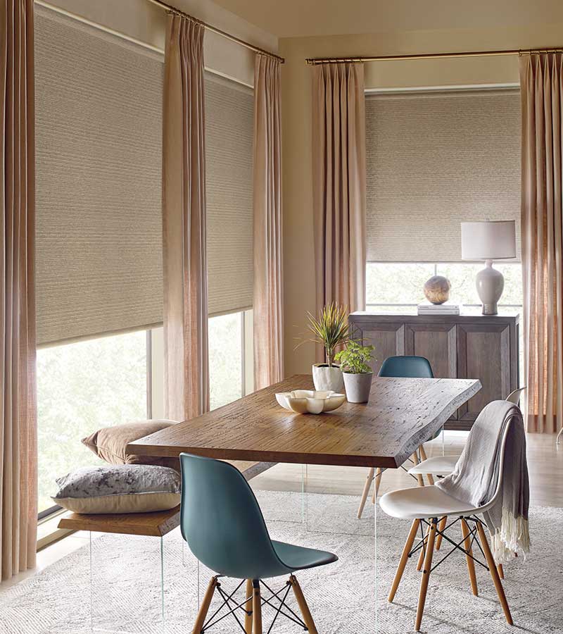 modern dining set close to windows with roller shades and drapery Naperville, IL