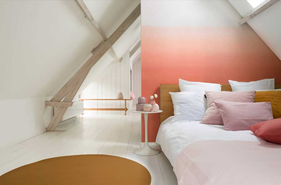 Ombre bedroom with coral tones