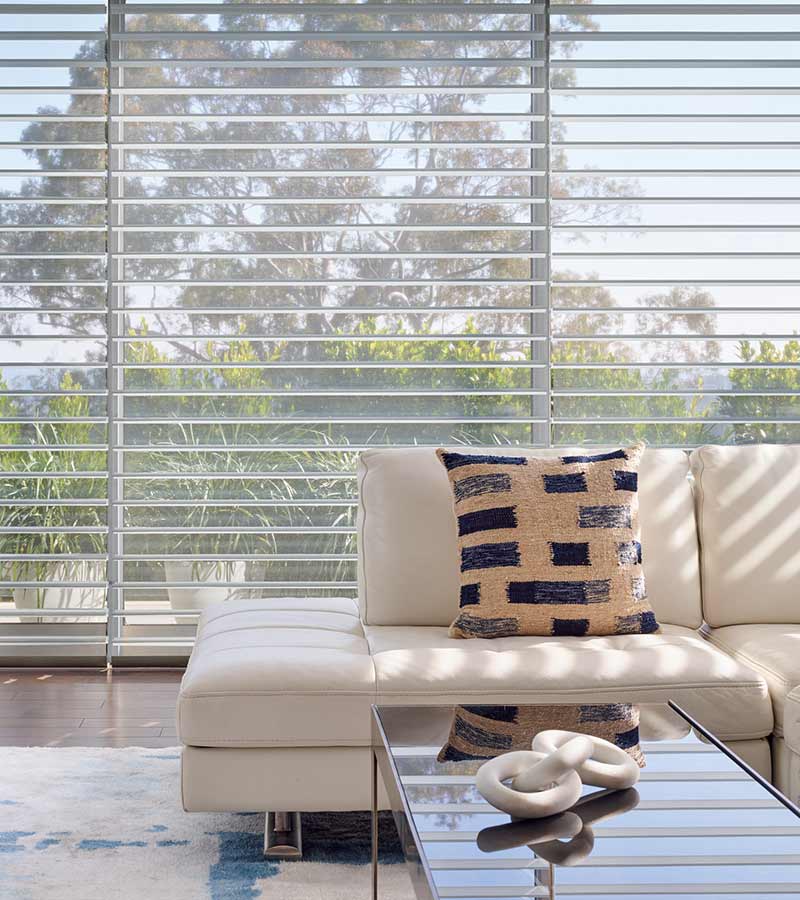 modern living room shades overlooking coastal garden in West Hollywood, CA