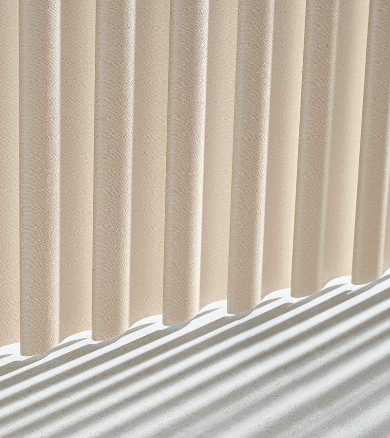 close up detail of vertical blinds in cream fabric in portland, OR