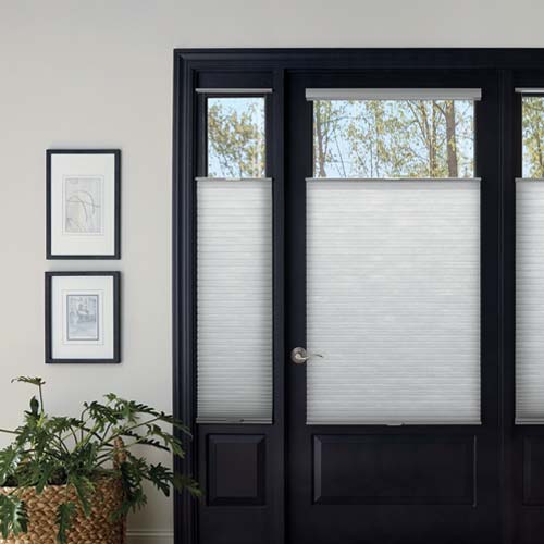 honeycomb shades on entryway door and sidelights with top down adjustments