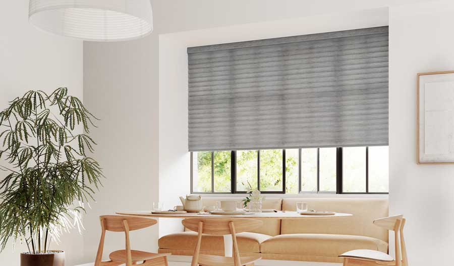 Modern breakfast room gray roller shades