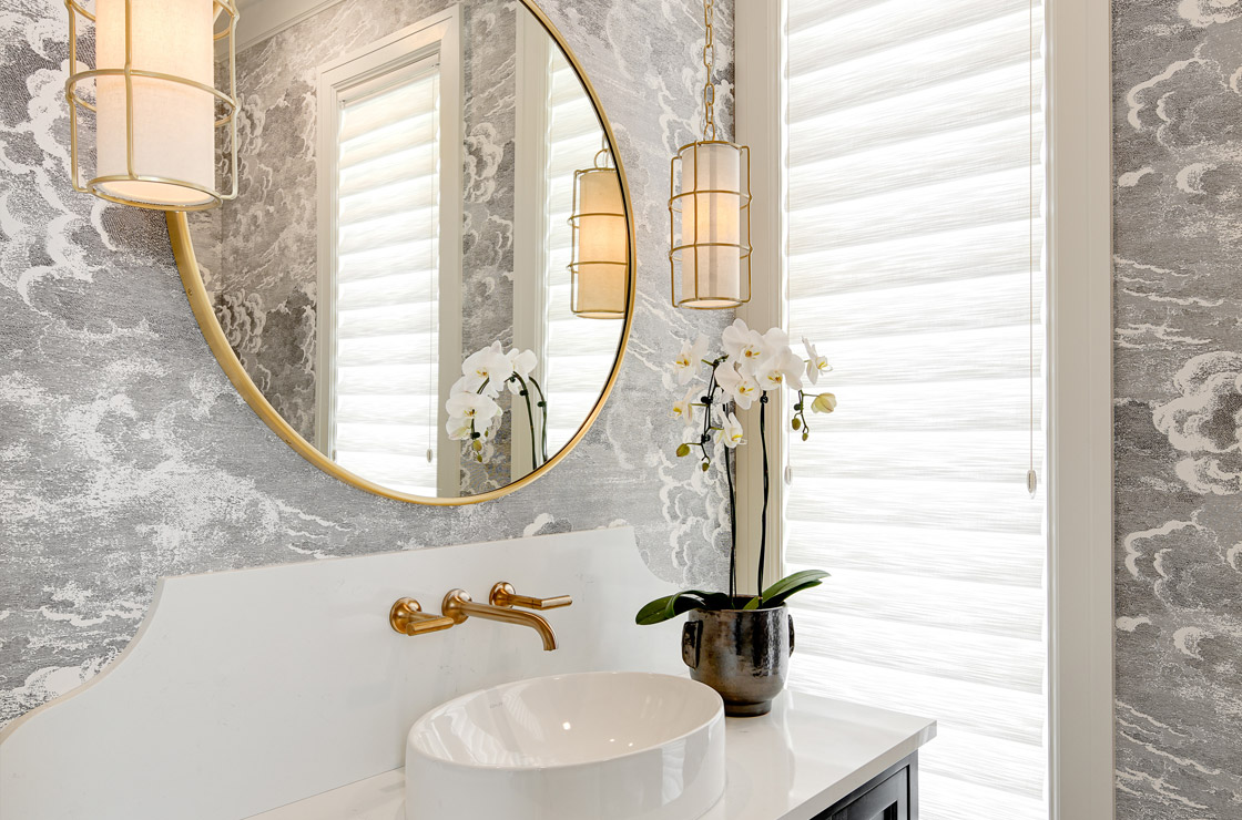 vignette modern roman shades in bright bathroom by sink