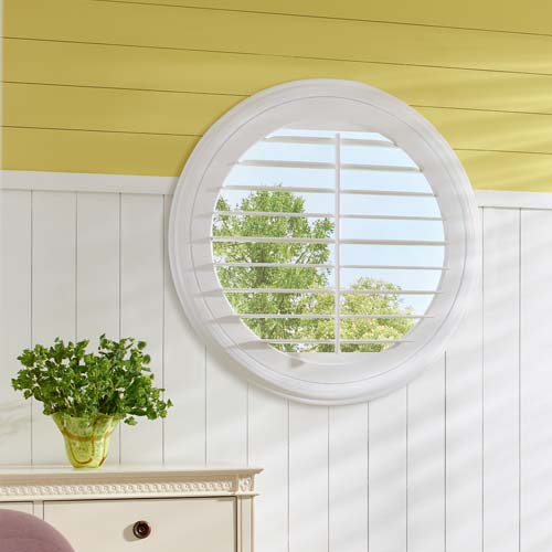 white shutters on round window