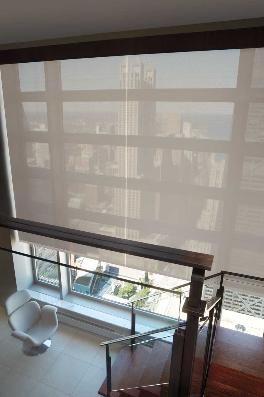 floor to ceiling windows in Chicago next to stairs