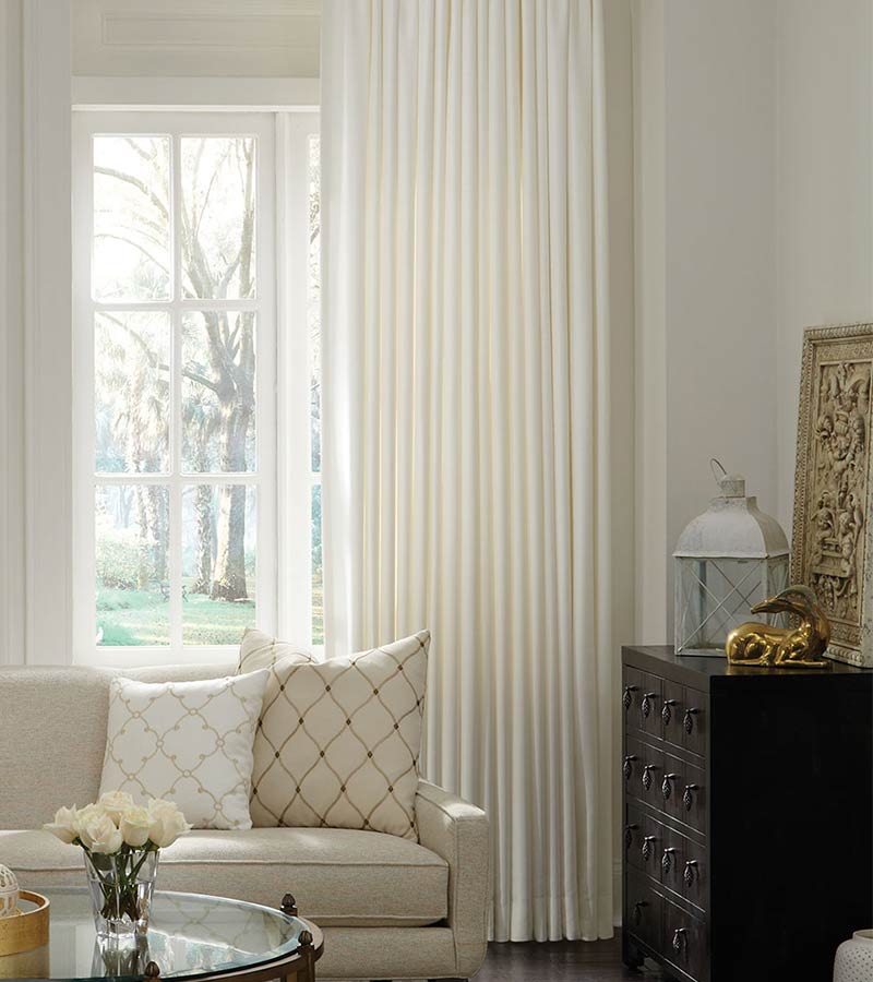 cream floor to ceiling custom window treatments on french doors