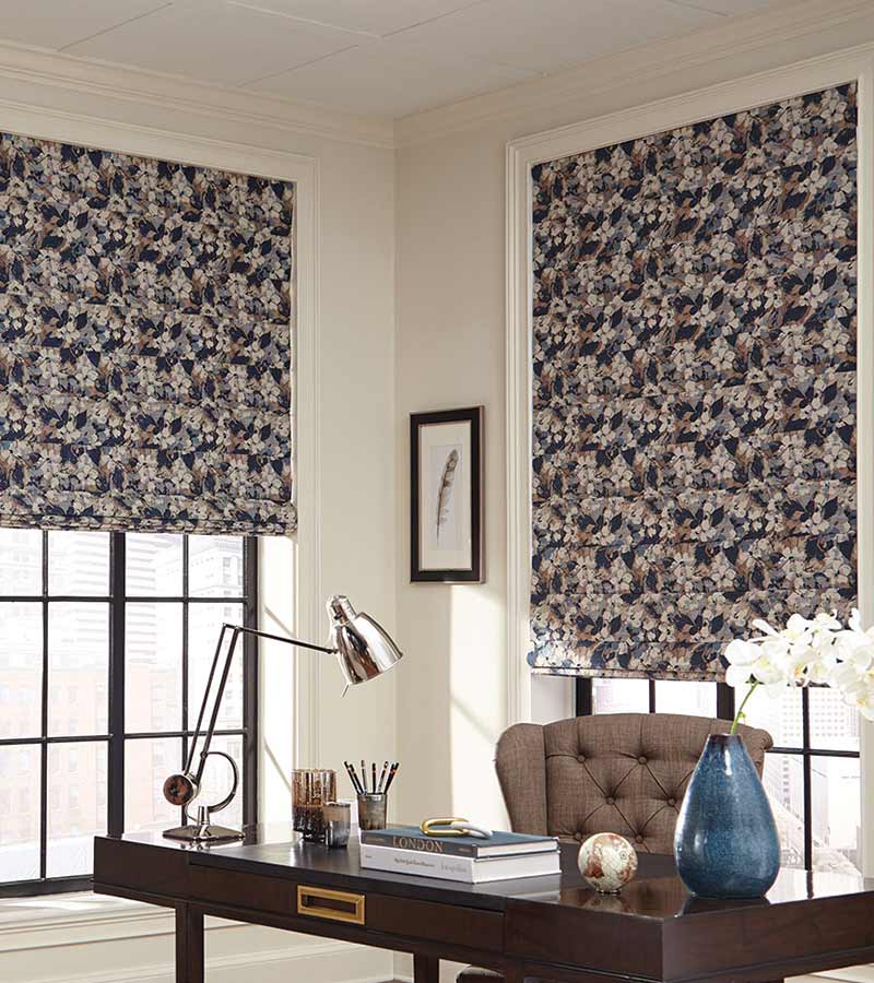 maximalist flower motif on fabric shade in home office windows with black trim