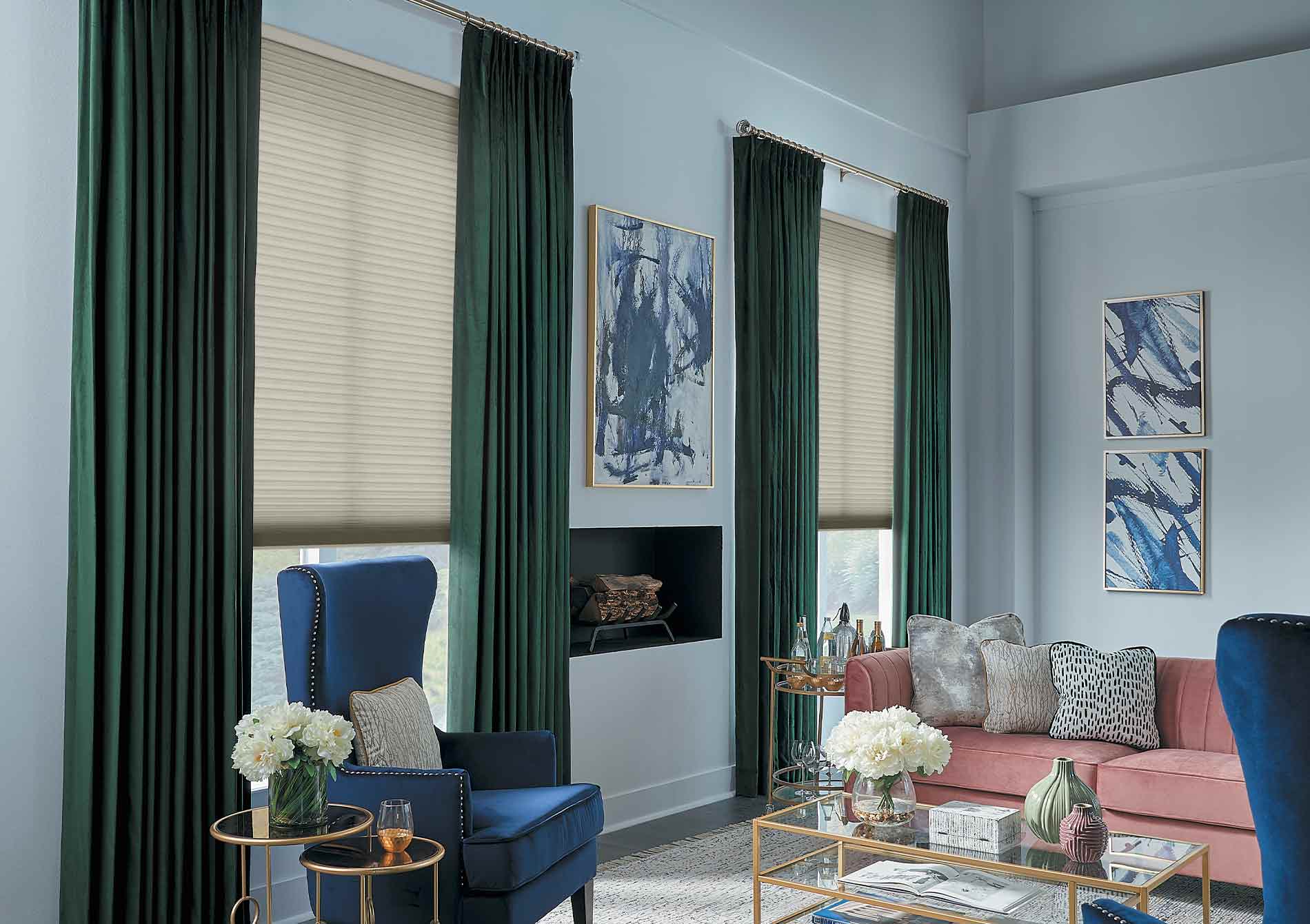 dark green drapery and cellular shades in traditional living room