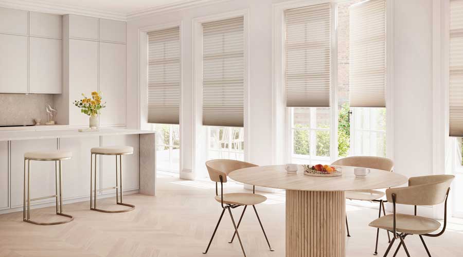 neutral kitchen with same color honeycomb shades for minimalist design in Winnetka IL