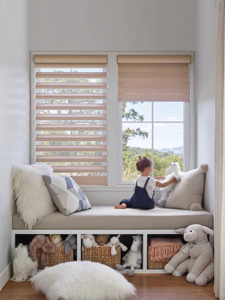 window seat in kids' rooms is a great place to read and play, but cordless window coverings are important