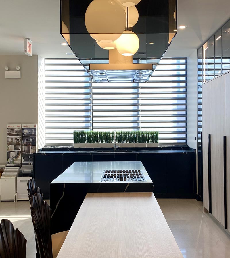 pirouette window shadings in dining area of modern commercial showroom