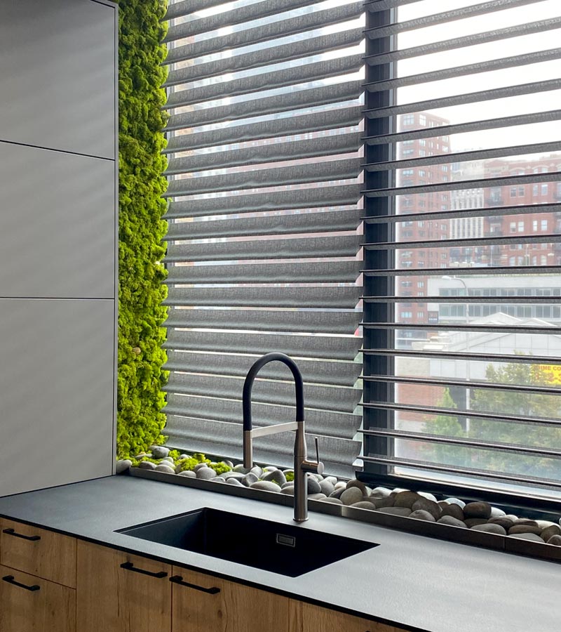 grey silhouette window shadings over kitchen sink