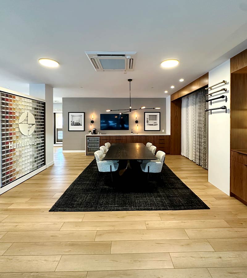 interior view of window treatment studio with hunter douglas blinds and shades