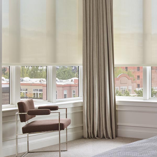 designer roller shades with custom draperies