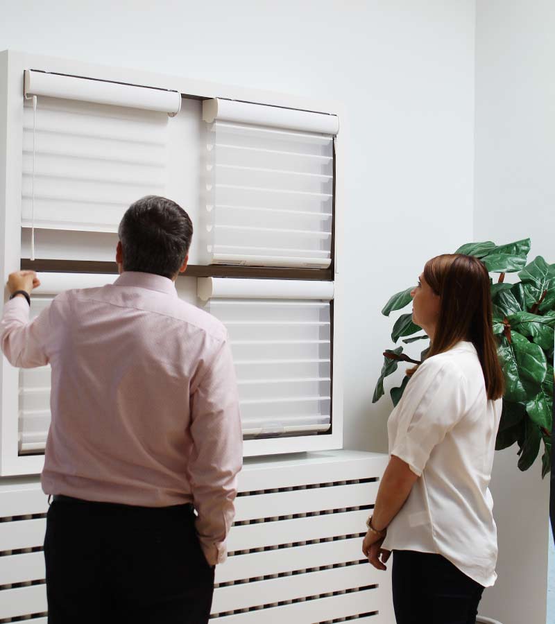 people looking at window shades in winnetka store