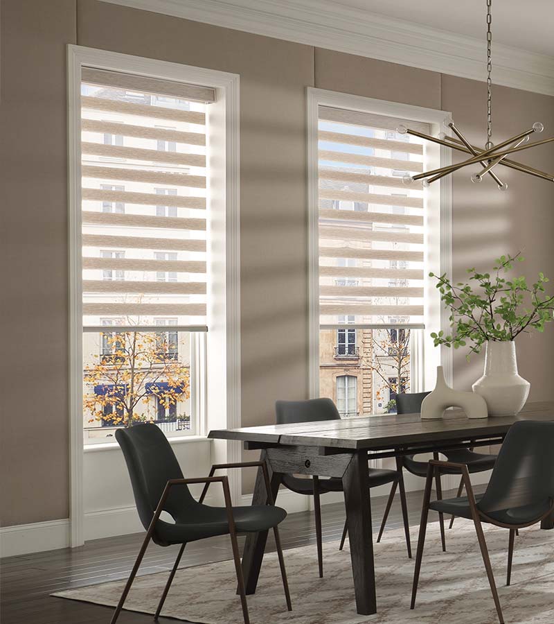 Dining room windows with Hunter Douglas banded shades
