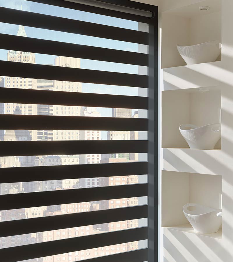 Black zebra roller shades that rotate fabric layered shades for room darkening