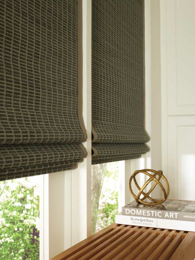 Green woven roman shades with wooden bench for fall inspired fabrics