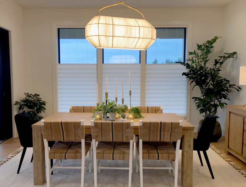 neutral tones dining room with top down bottom up vignette roman shades Scandinavian design