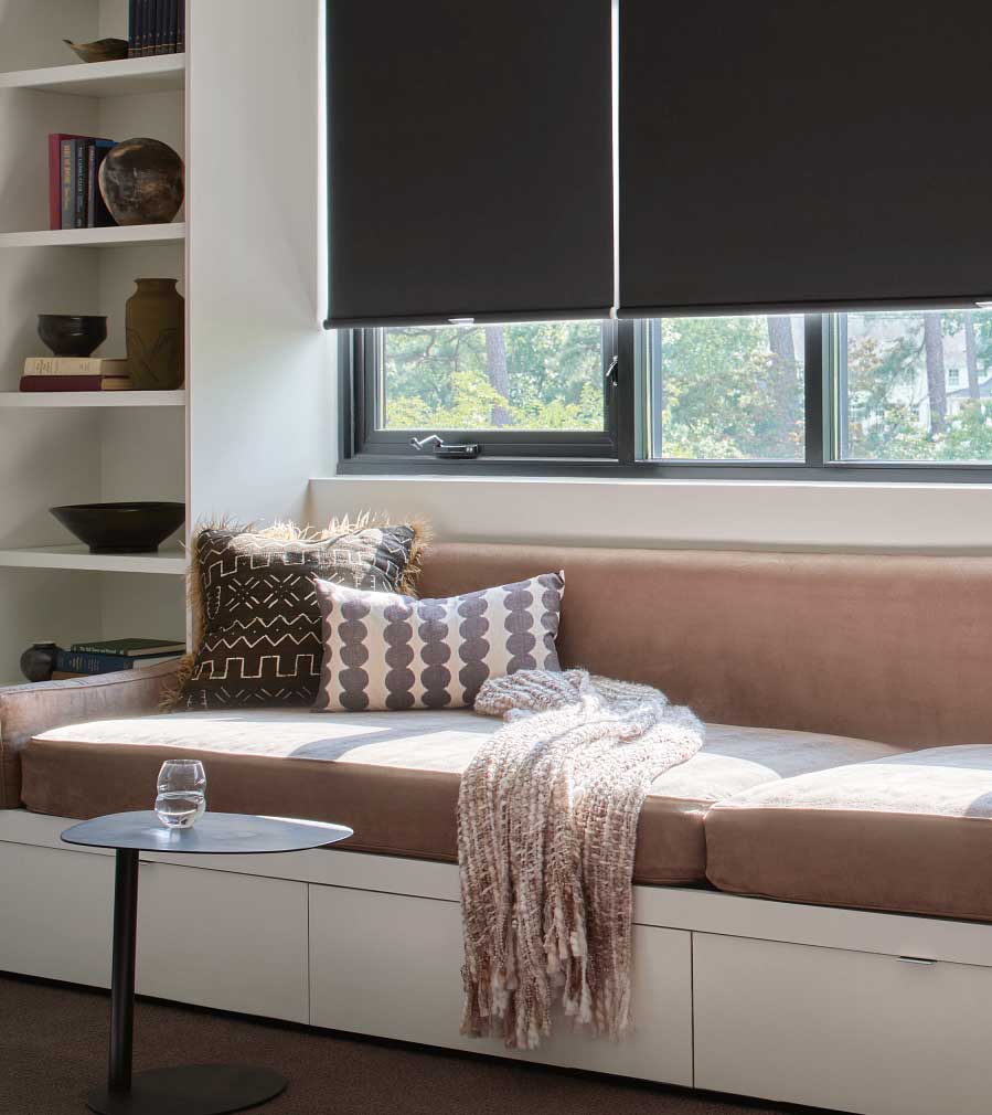 casement window with blackout roller shades