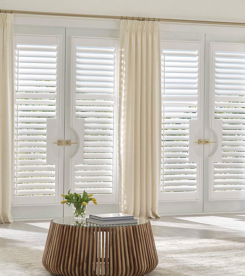 Window Coverings for Sliding Glass Doors white shutters in chicago with cut out handles