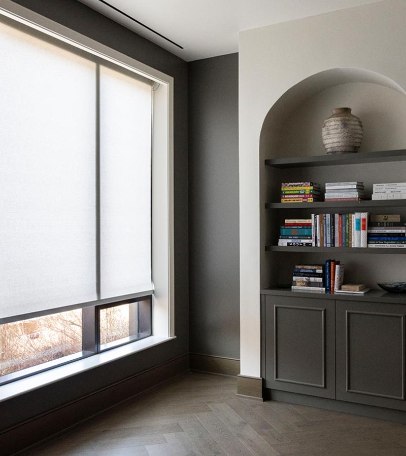large designer roller shades in bedroom