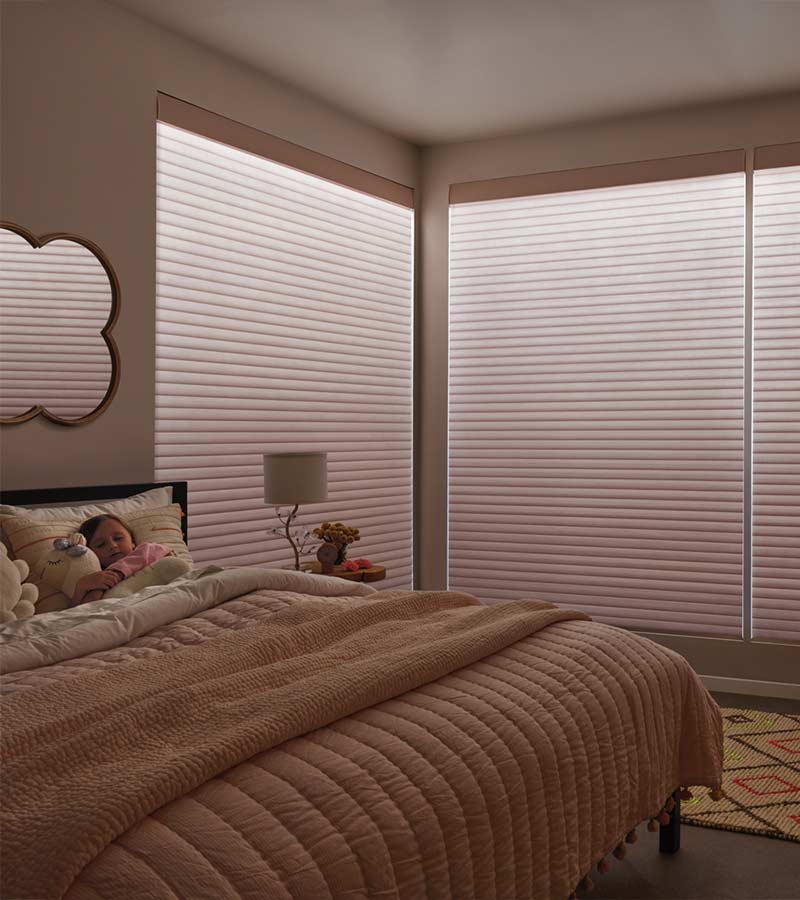 bedroom shades with warm tone LED window shades by Hunter Douglas Aura
