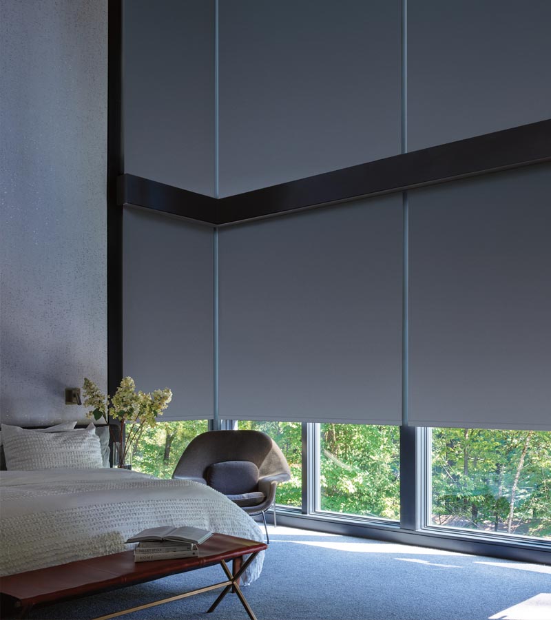 hunter-douglas-white-plains-designer-screen-shades-blackout-roller-shades-for-bedroom Blackout roller screen shades on large windows in Westchester