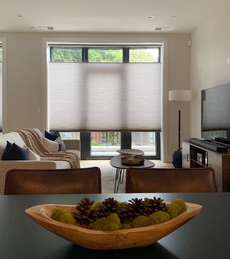 top down honeycomb shades on sliding door with black trim in Westchester NY for energy efficiency