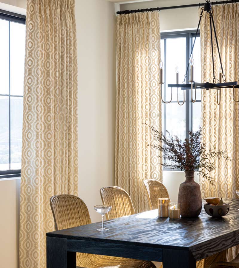 skyline-window-coverings-white-plains-new-york-custom-drapery-with-gold-patterns-for-dining-room neutral patterned draperies on black trim windows in Westchester home