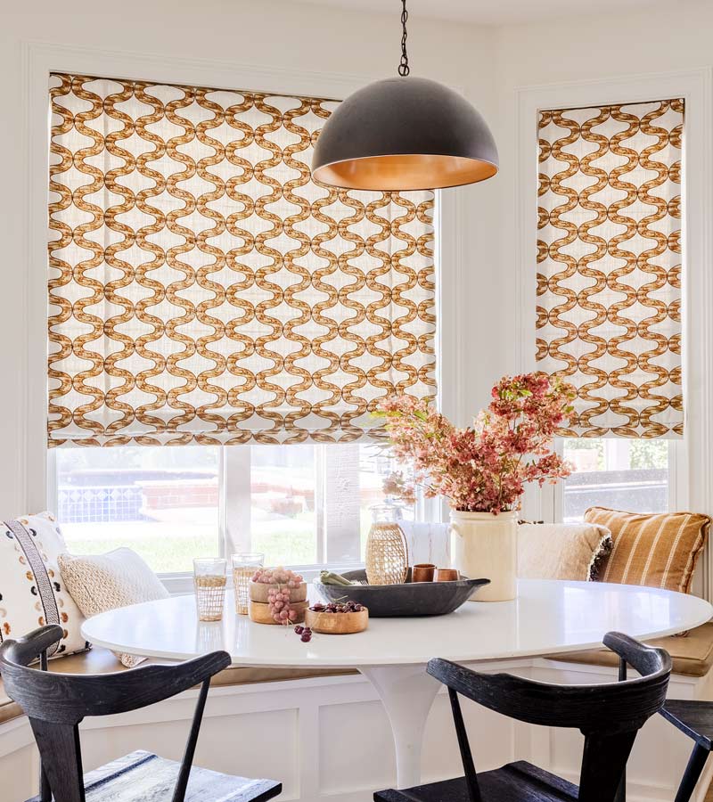 skyline-window-coverings-white-plains-new-york-custom-patterned-roman-shades-for-kitchen-nook patterned fabric roman shades in breakfast nook of white plains home
