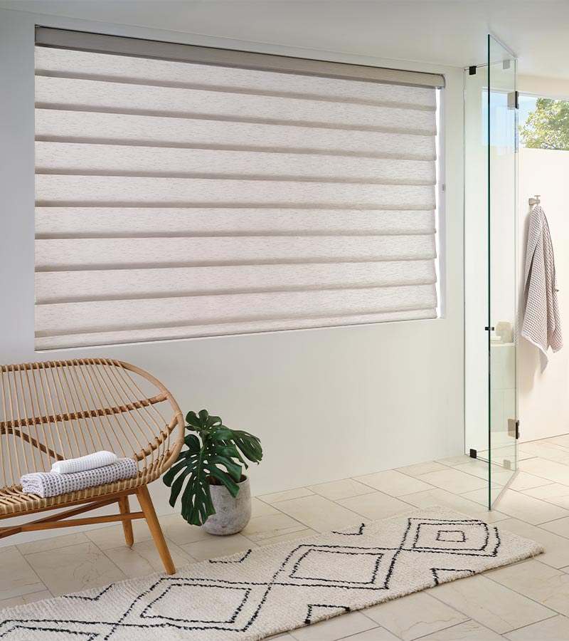 vignette-roman-shades-bathroom-blind-hunter-douglas-skyline-window-coverings bathroom with roman shades for light filtering and privacy skyline window coverings