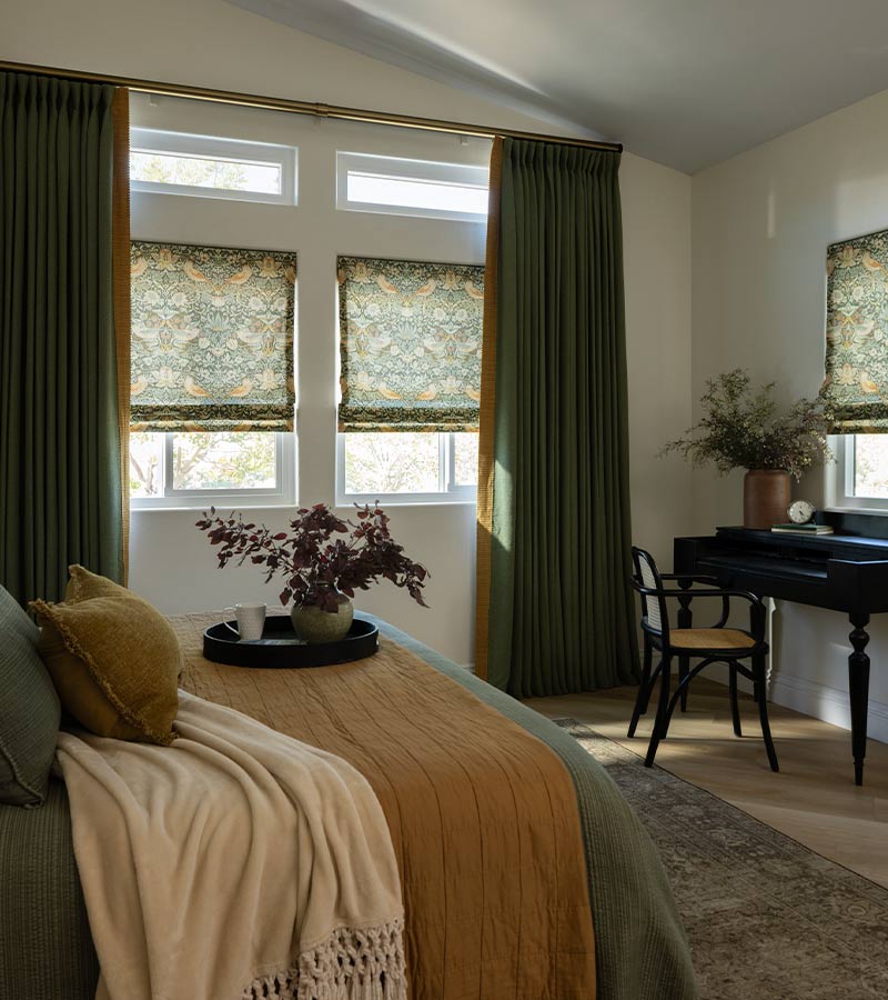 energy-efficient-custom-roman-shades-window-treatments-skyline-window-coverings green drapery with roman shades in bedroom energy efficient