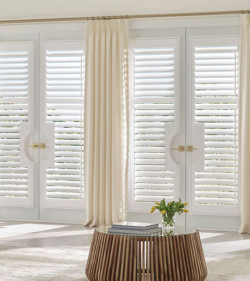 French doors with Palm Beach™ PolySatin™ vinyl shutters
