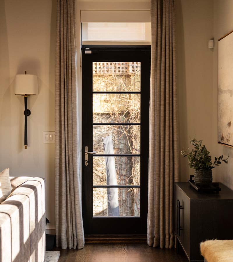 urbane-home-dee-thompson-custom-drapery-skyline-window-coverings-trade-program modern patio door shades with side draperies for flexible light control