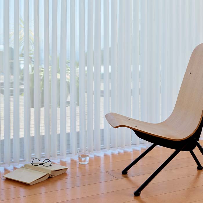 luminette-vertical-window-coverings-skyline-hunter-douglas Luminette® privacy sheers on sliding glass doors with soft filtered natural light