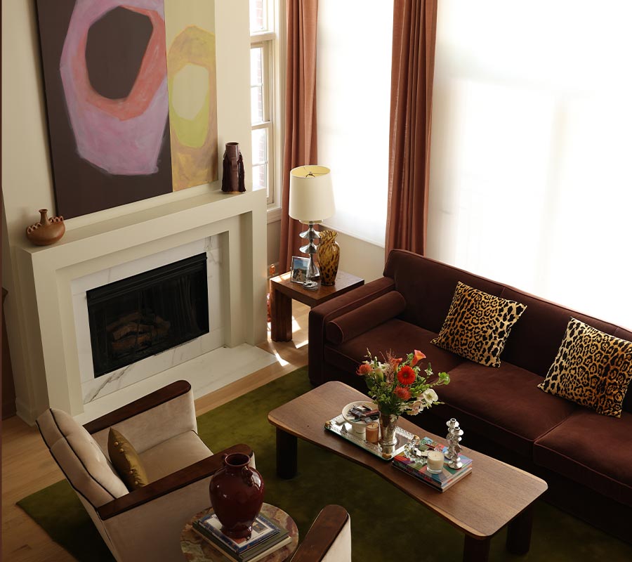floor-length custom drapery layered with window shades in modern Chicago condo